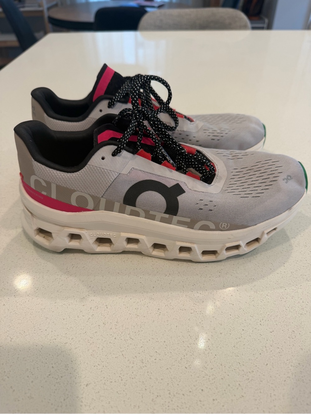 On Running CloudmonsterWomen's Athletic Shoes in Light Gray with Pink Highlights